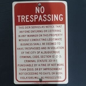 Red No Trespassing Sign
